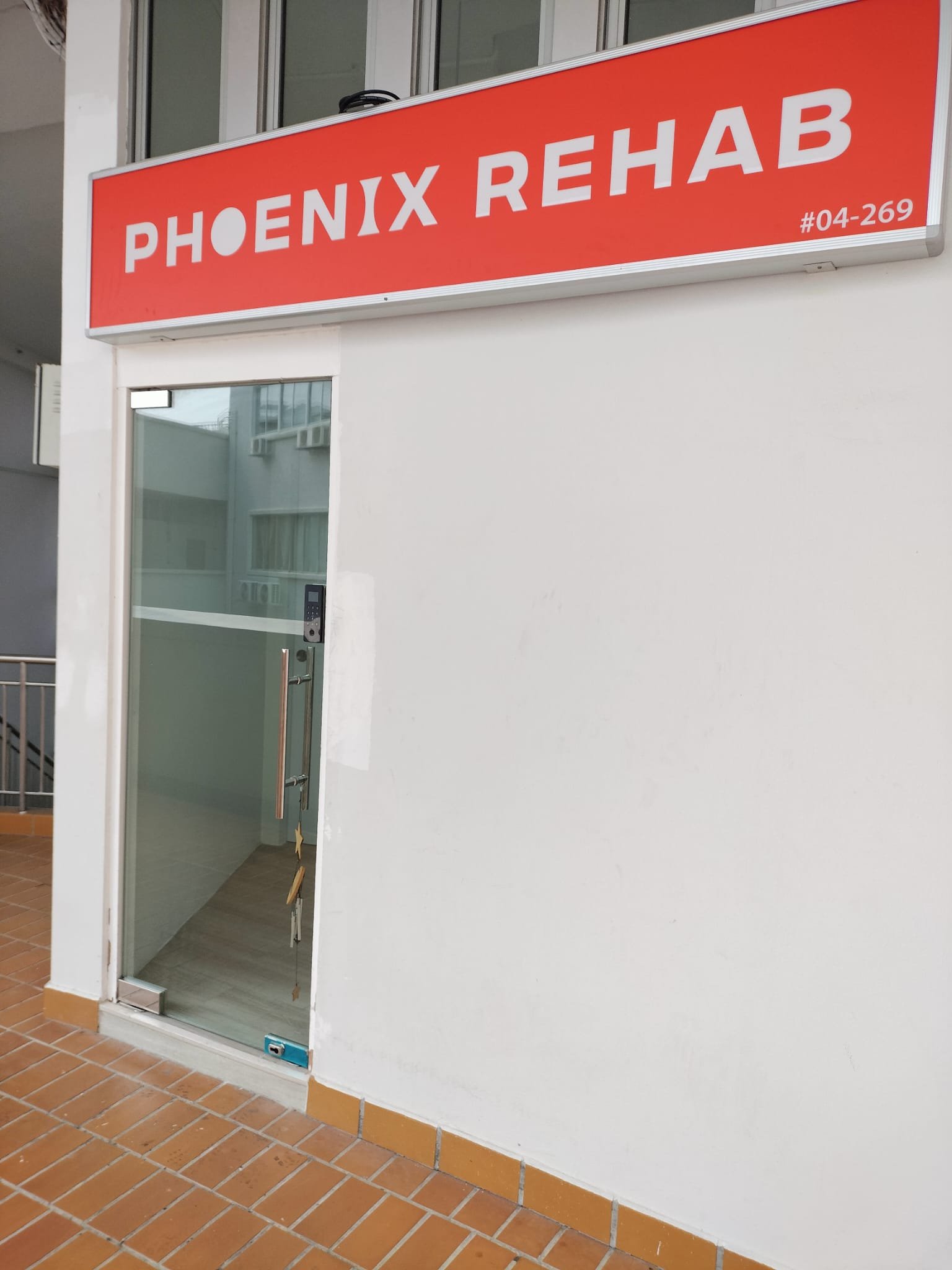 Phoenix Rehab Serangoon clinic door, unit 04-269, 265 Serangoon Central Drive